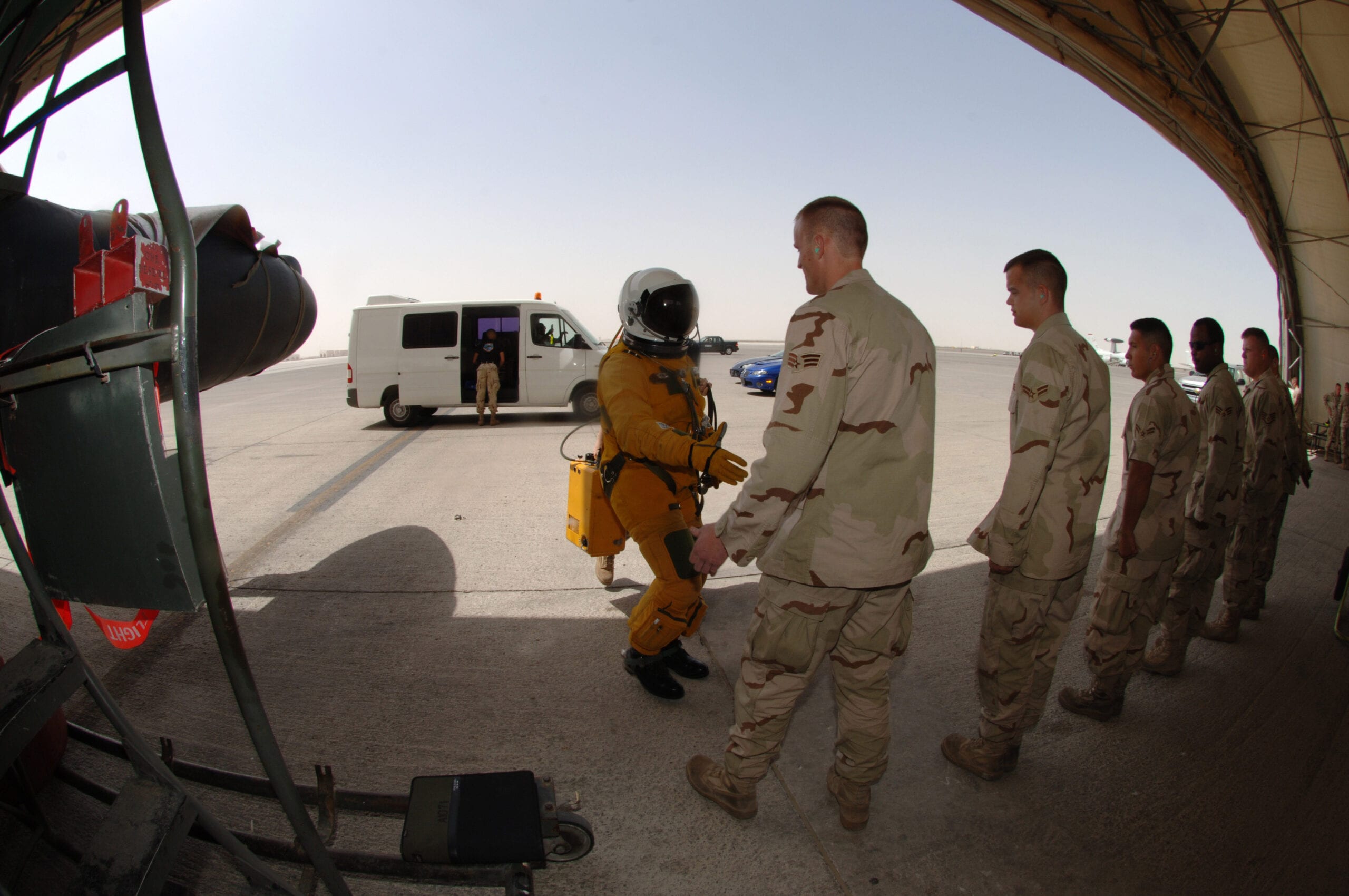 ross franquemont shakes hands with the crew chiefs of his U-2 aircraft