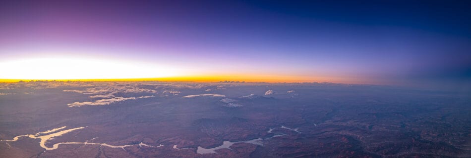 looking out the cockpit of a 737 at sunset overlooking Glen Canyon