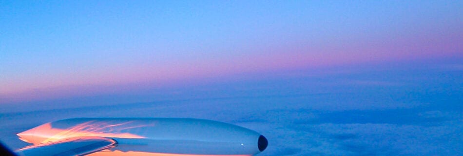 Looking out past the tip tank of the C-21